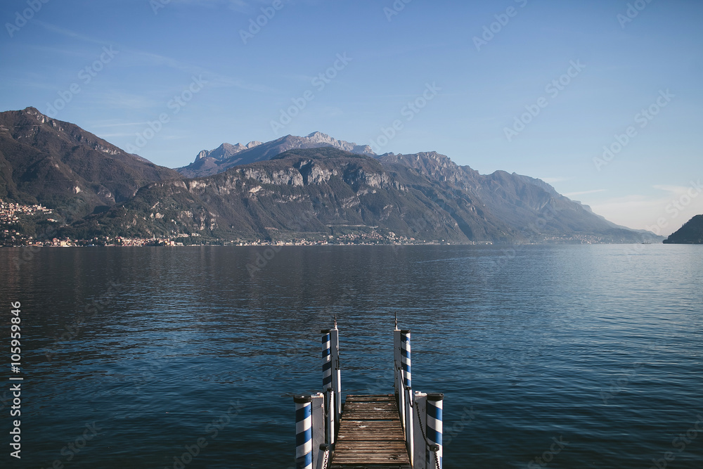 small pier near a mountain lake Como