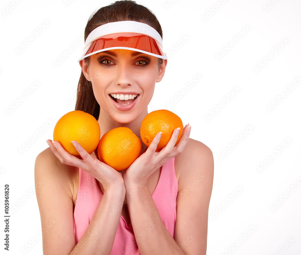 Beautiful close-up young woman with oranges. Healthy food concep Beautiful close-up young woman with oranges. Healthy food concep