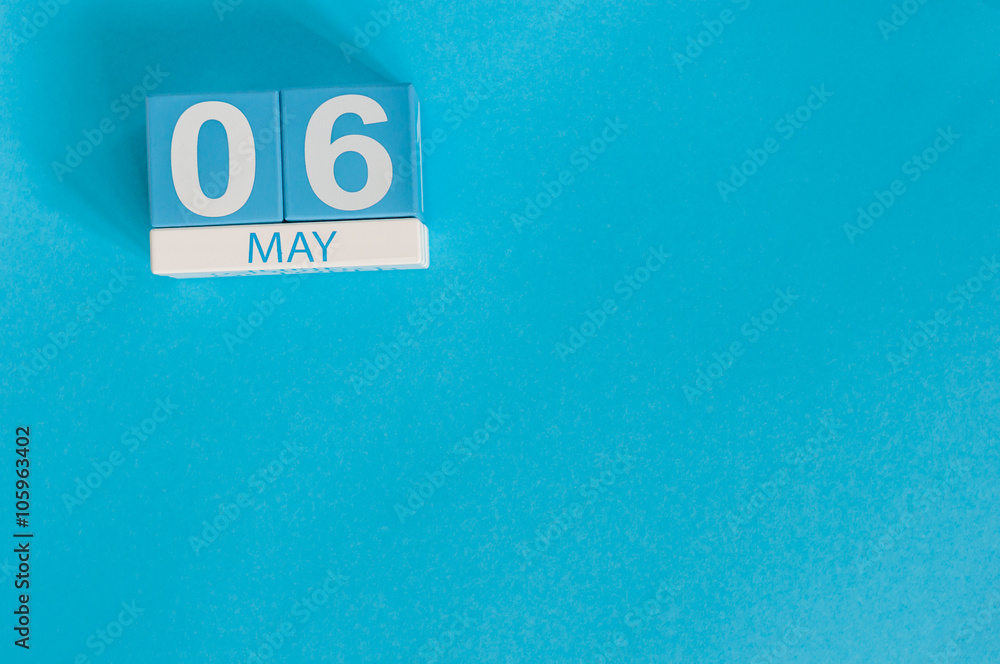 May 6th. Image of may 6 wooden color calendar on blue background. Spring day, empty space for text May 6th. Image of may 6 wooden color calendar on blue background. Spring day, empty space for text