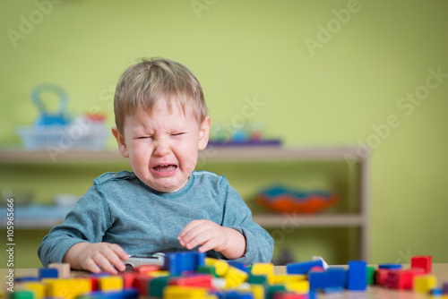 Tearful boy in nursery 