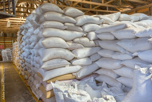 Stack of white bags at warehouse