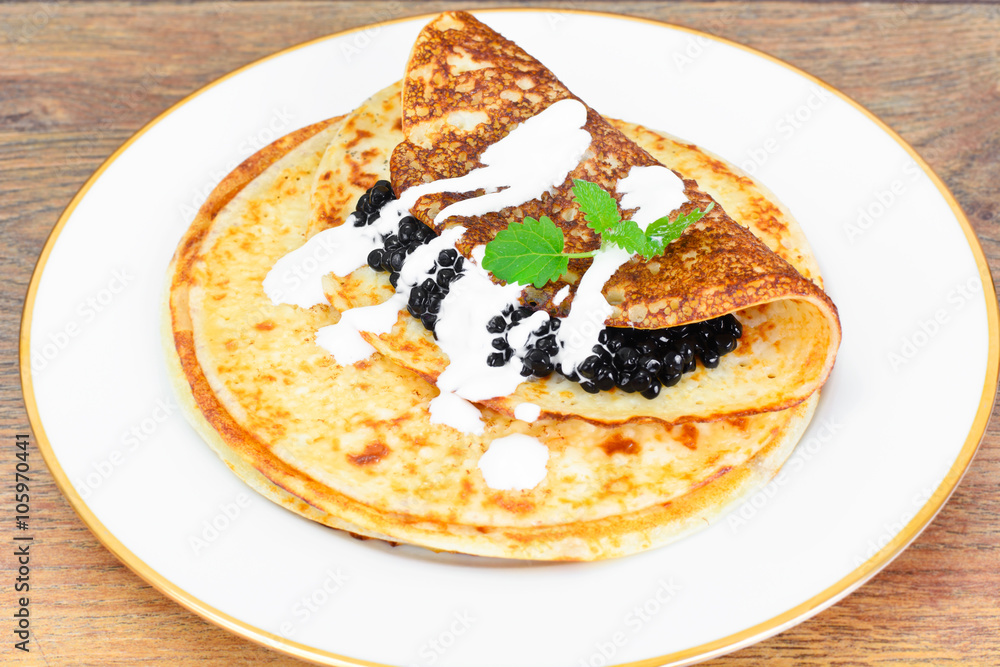 Pancakes with Black Caviar