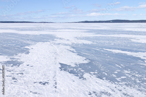Wallpaper Mural The surface of the lake covered with ice and blowing snow Torontodigital.ca