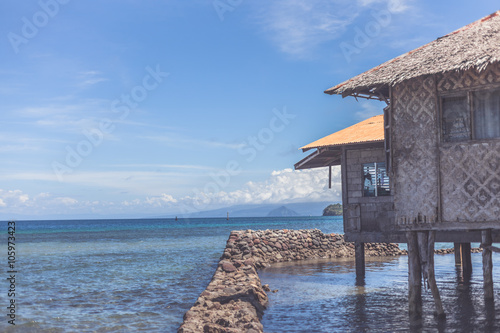 Traditional philippine hut standing in the sea or ocean. Bohol Island, Philippines.
