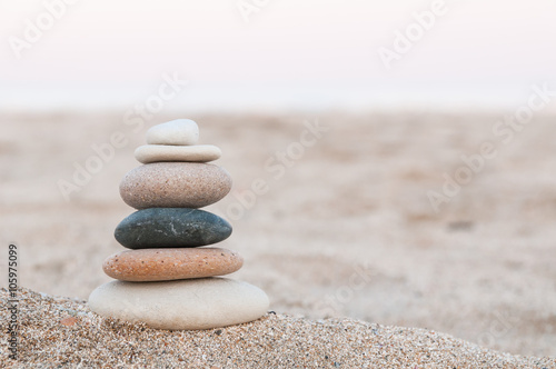 Canvas Print Zen Stones / Stacked zen stones on the beach