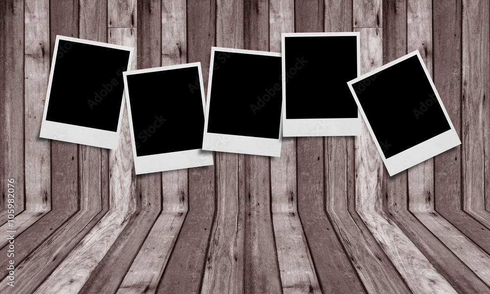 White paper picture frame on wood White paper picture frame on wood