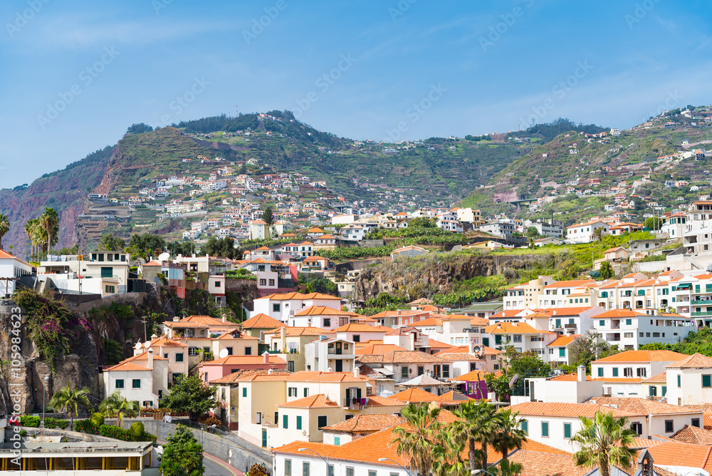 Panoramic view of tranquil hillside town