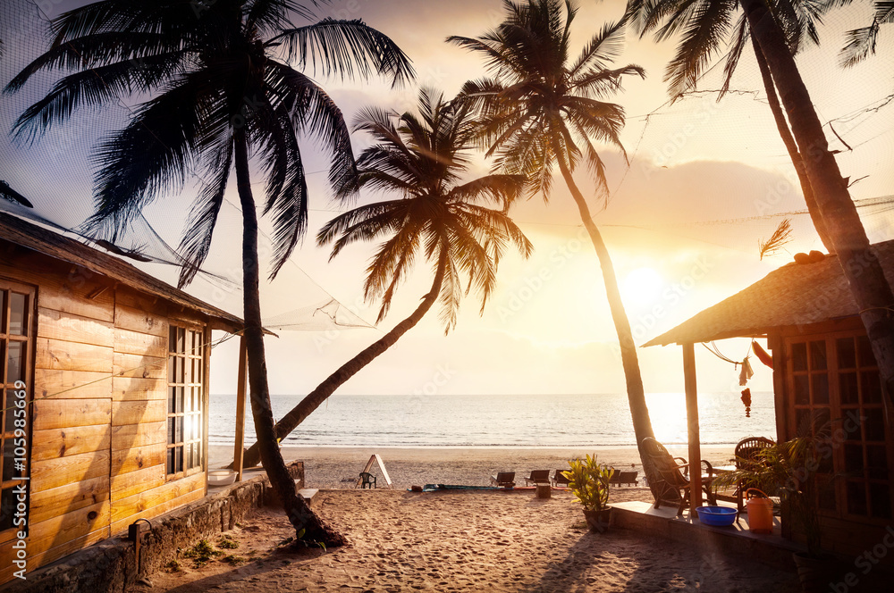 Beautiful Sunset at tropical beach - obrazy, fototapety, plakaty 