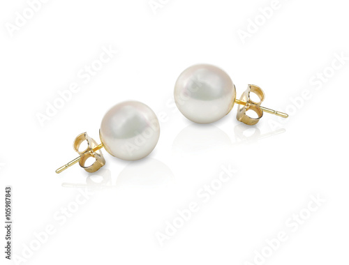 Fototapeta White pearl pieced earrings pair fine jewelry isolated on white