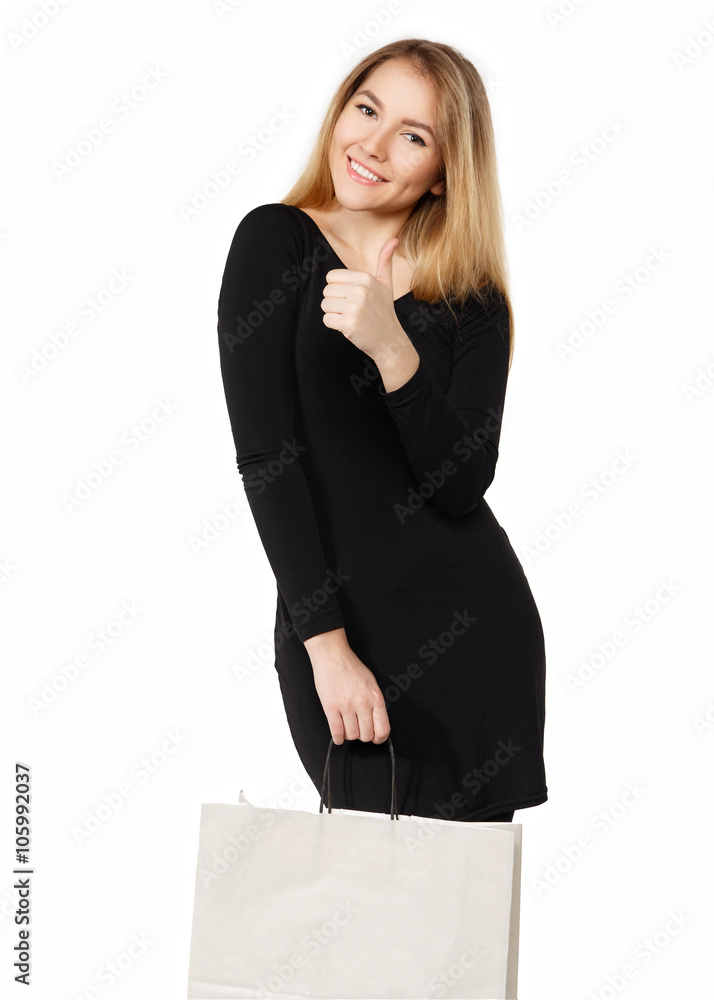 Young woman in a black dress with shopping bags, isolated on a w Young woman in a black dress with shopping bags, isolated on a w