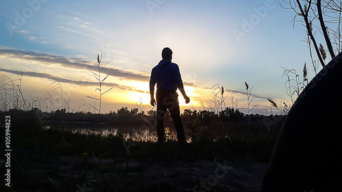 Man Standing Watching the sunset