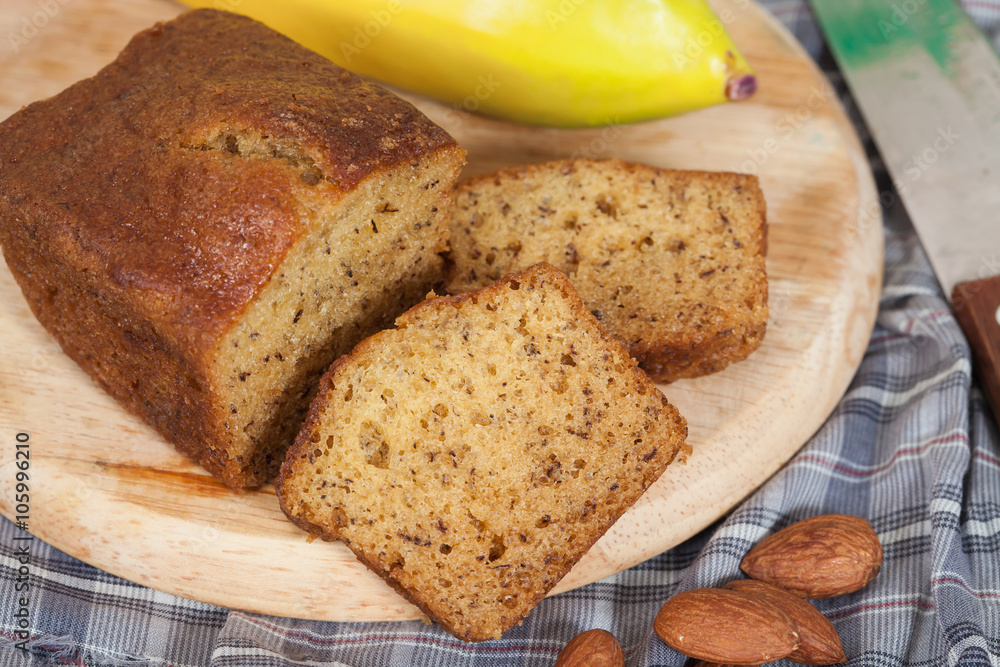 Homemade banana bread sliced on a table . rustic style Homemade banana bread sliced on a table . rustic style
