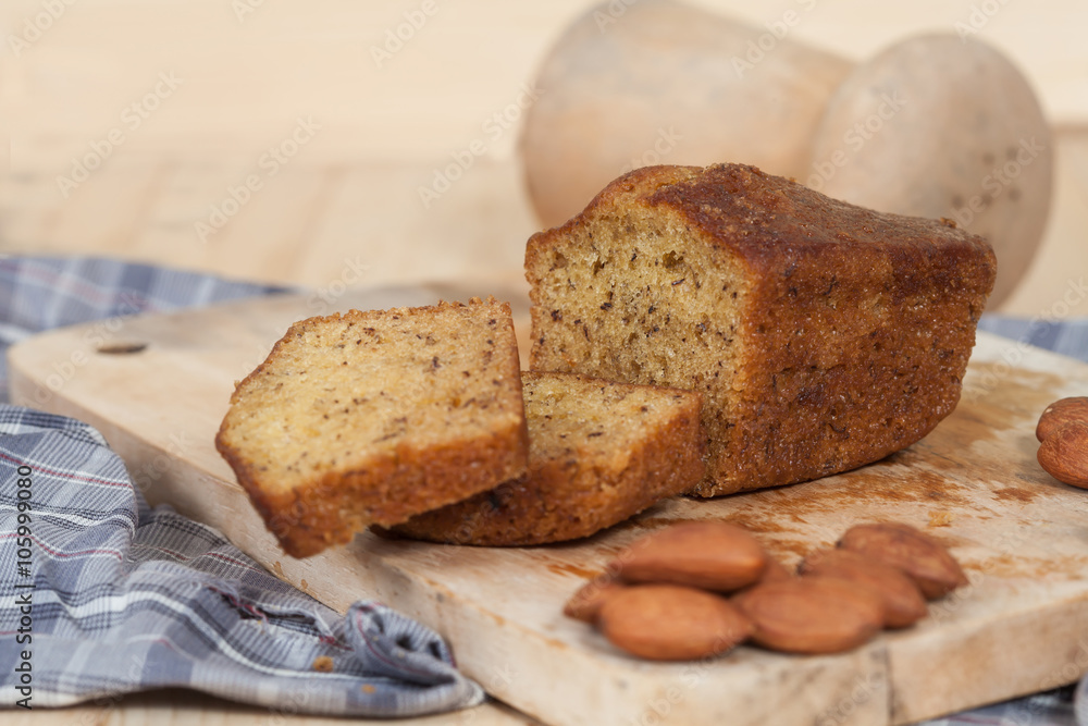 Homemade banana bread sliced on a table . rustic style Homemade banana bread sliced on a table . rustic style