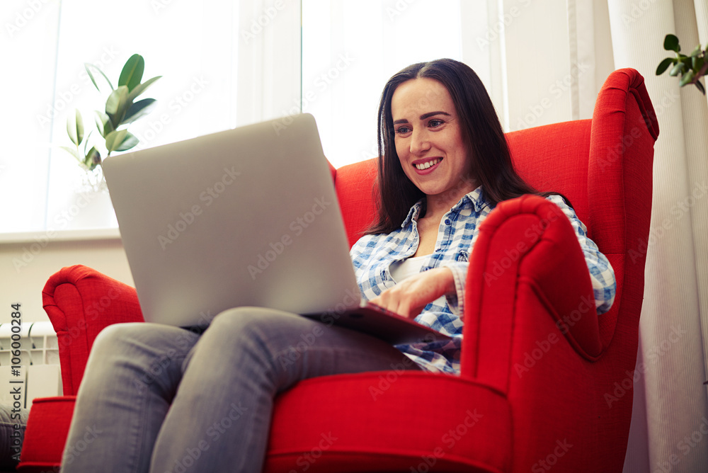 young woman using laptop at home young woman using laptop at home