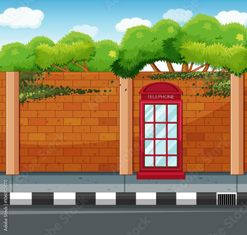 Scene with telephone booth on the sidewalk