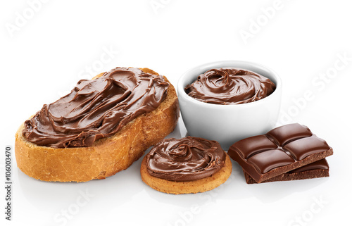 Toast and bowl with chocolate butter isolated on white backgroun