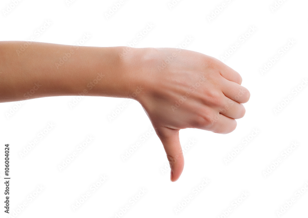 Hand making a thumbs down gesture. Image of human hand showing thumb down in isolation