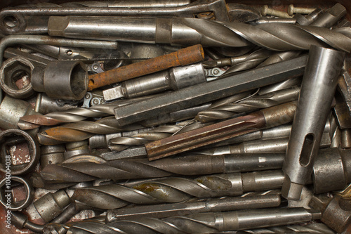 group old rust drill tool background