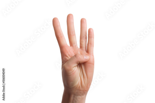 Isolated hand shows the number four.