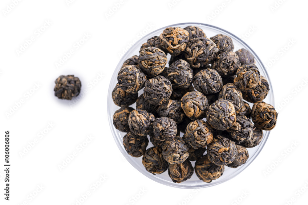 close-up of Tea black dragon pearl tea, isolated on white backgr close-up of Tea black dragon pearl tea, isolated on white backgr
