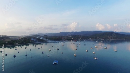 Aerial view of Thailand at sunrise. Popular summer beach in Thailand with ocean and view on the bay with yachts