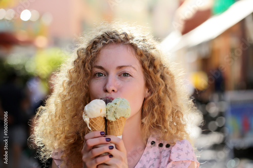 Smiling woman with ice cream