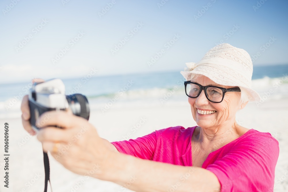 Senior woman taking selfie