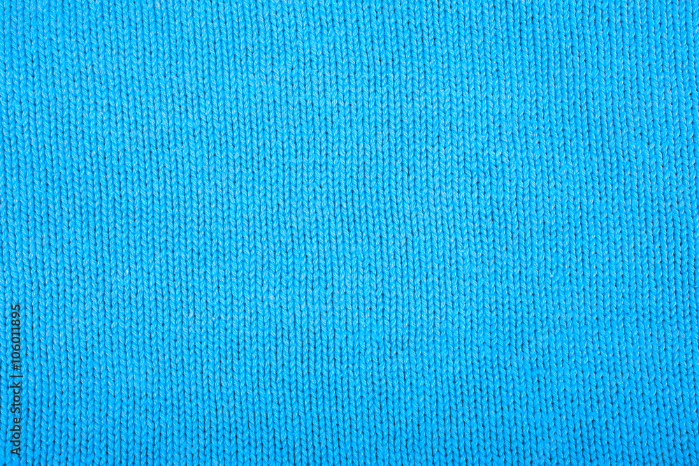 Wool sweater texture close up. Knitted jersey background with a
