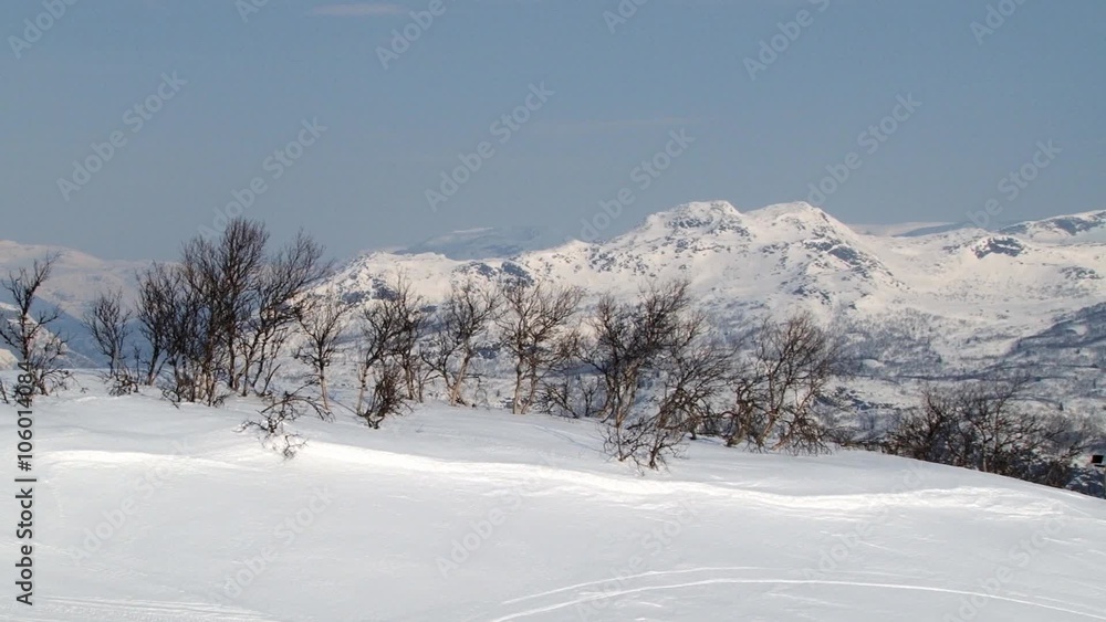 View to the mountains and trees covered with snow in Hemsedal, Norway. View to the mountains and trees covered with snow in Hemsedal, Norway.