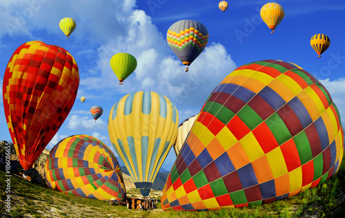 Colorful hot air balloons against blue sky at Cappadocia Turkey