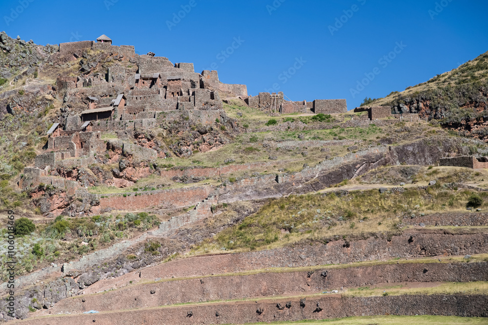 Inca agricultural terraces and village ruins in Pisaq,  Peru