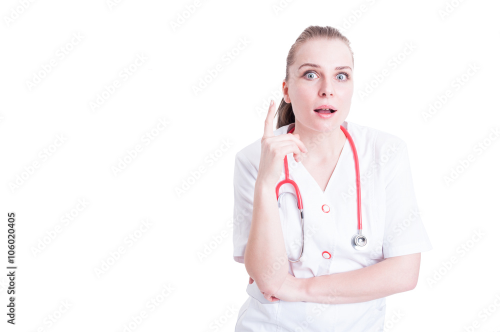 Attractive young female doctor having a solution or idea Attractive young female doctor having a solution or idea