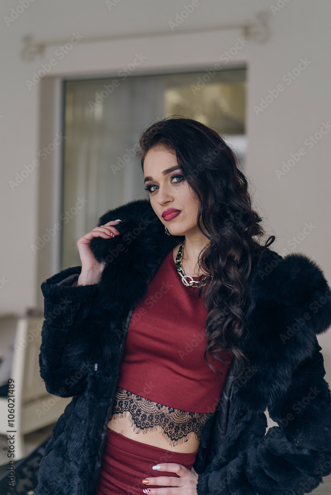 Elegant model in black coat Elegant model in black coat