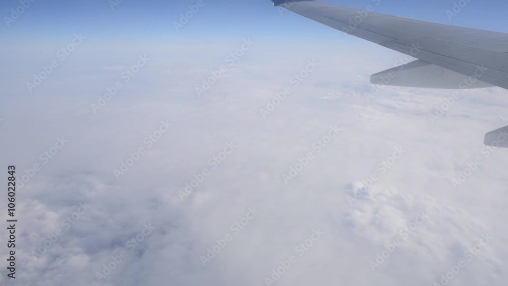 Aerial View from the Airplane Window Airplane, Wing and Clouds