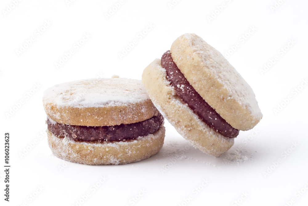 Two Vanilla Jam Cookies closeup, Vanilice, Serbian small sandwich cookie on white background