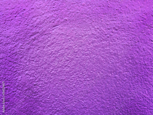 Texture of cracked purple concrete wall for background
