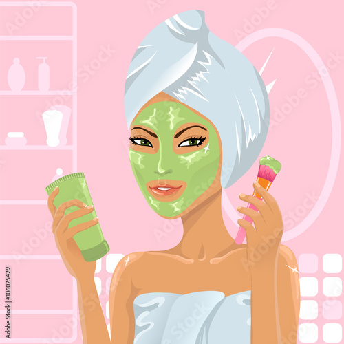 Girl applying facial mask with brush