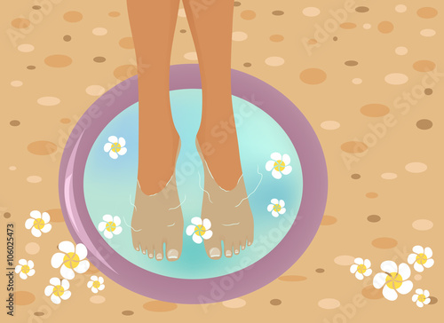 Beautiful feet in a SPA bowl