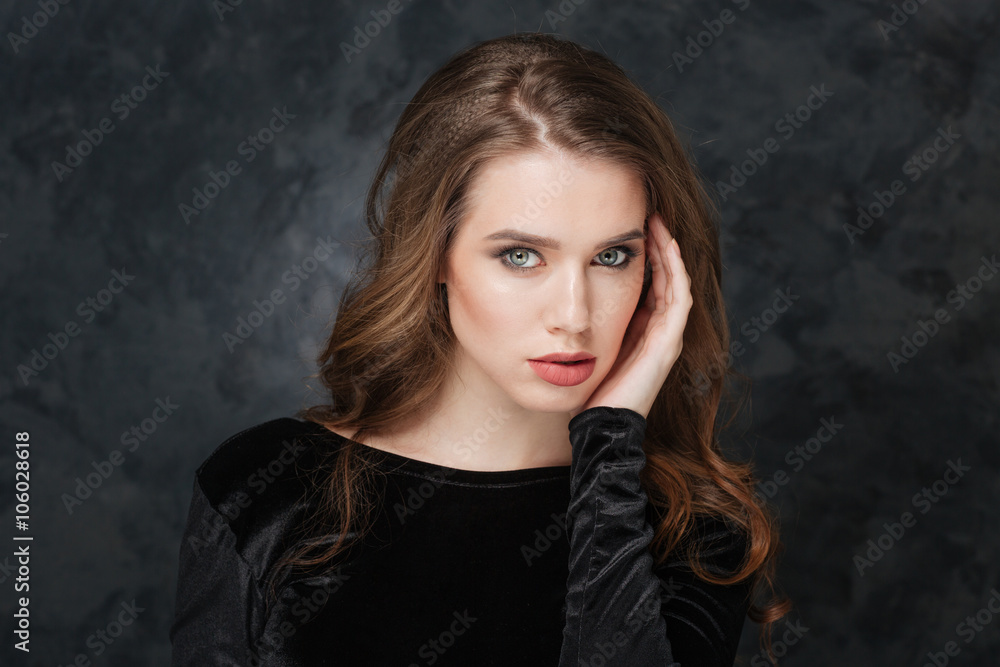 Sensual young woman touching sking on her face Sensual young woman touching sking on her face