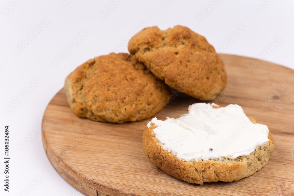 Bread with cream cheese isolated on white background