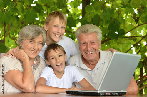 Family with laptop