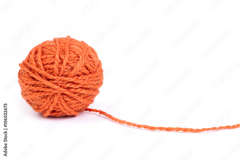 ball of orange wool yarn - isolated ball of orange wool yarn - isolated