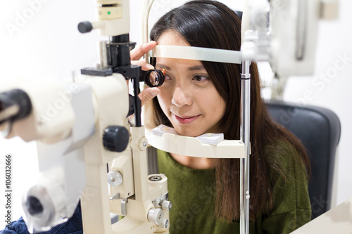 Woman doing examination of eyes