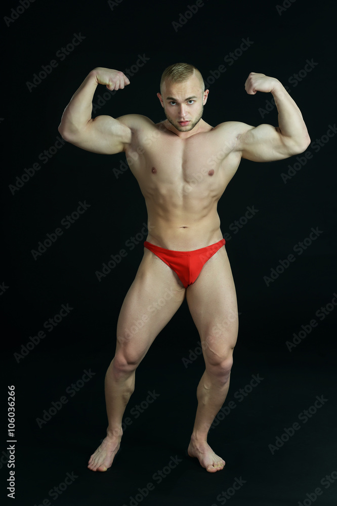 Naklejka premium Bodybuilder posing