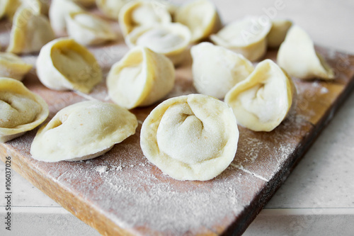 Uncooked dumplings (Pelmeni). Traditional Russian dish