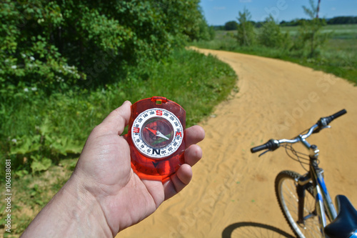 compass and bike.