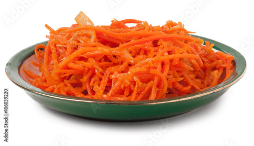 Hot carrot salad in plate on white background