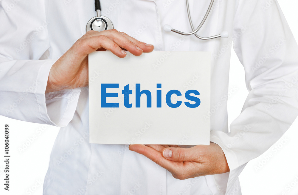 Ethics card in hands of Medical Doctor Ethics card in hands of Medical Doctor