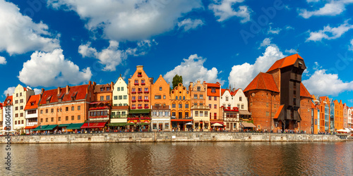Panorama of Old Town with Old harbour crane and city gate Zuraw, Dlugie Pobrzeze and Motlawa River, Gdansk, Poland photo