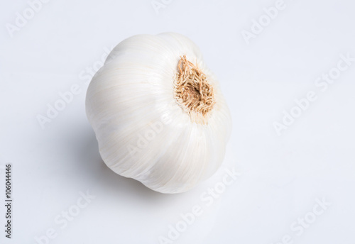 Bulb of garlic isolated on white background with shadow